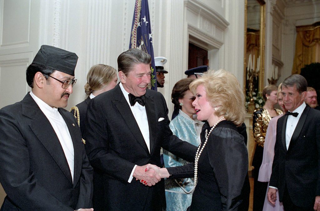 President Reagan during the State Visit of King Birendra Bir Kikram Shah Dev of Nepal with Joan Rivers in the East Room
